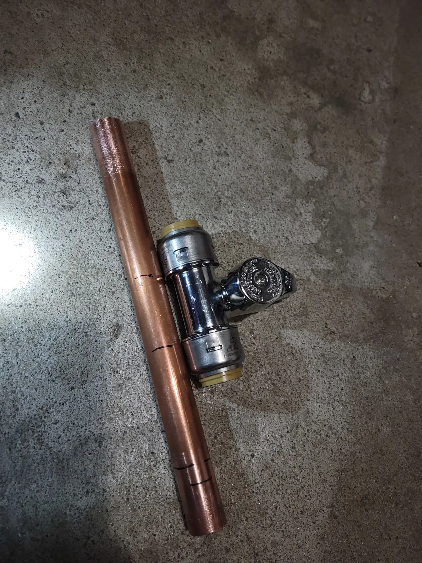 Chrome push-fit tee valve joined to a copper supply pipe for a fridge water line in Vaughan
