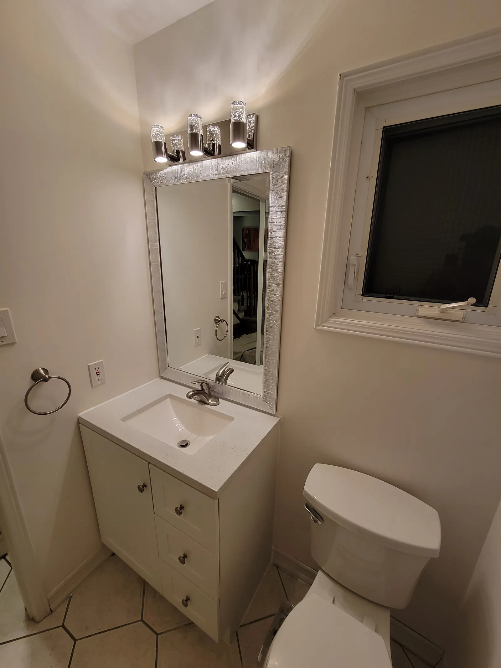 Powder-room refresh in Newmarket, Ontario by VOL Handyman