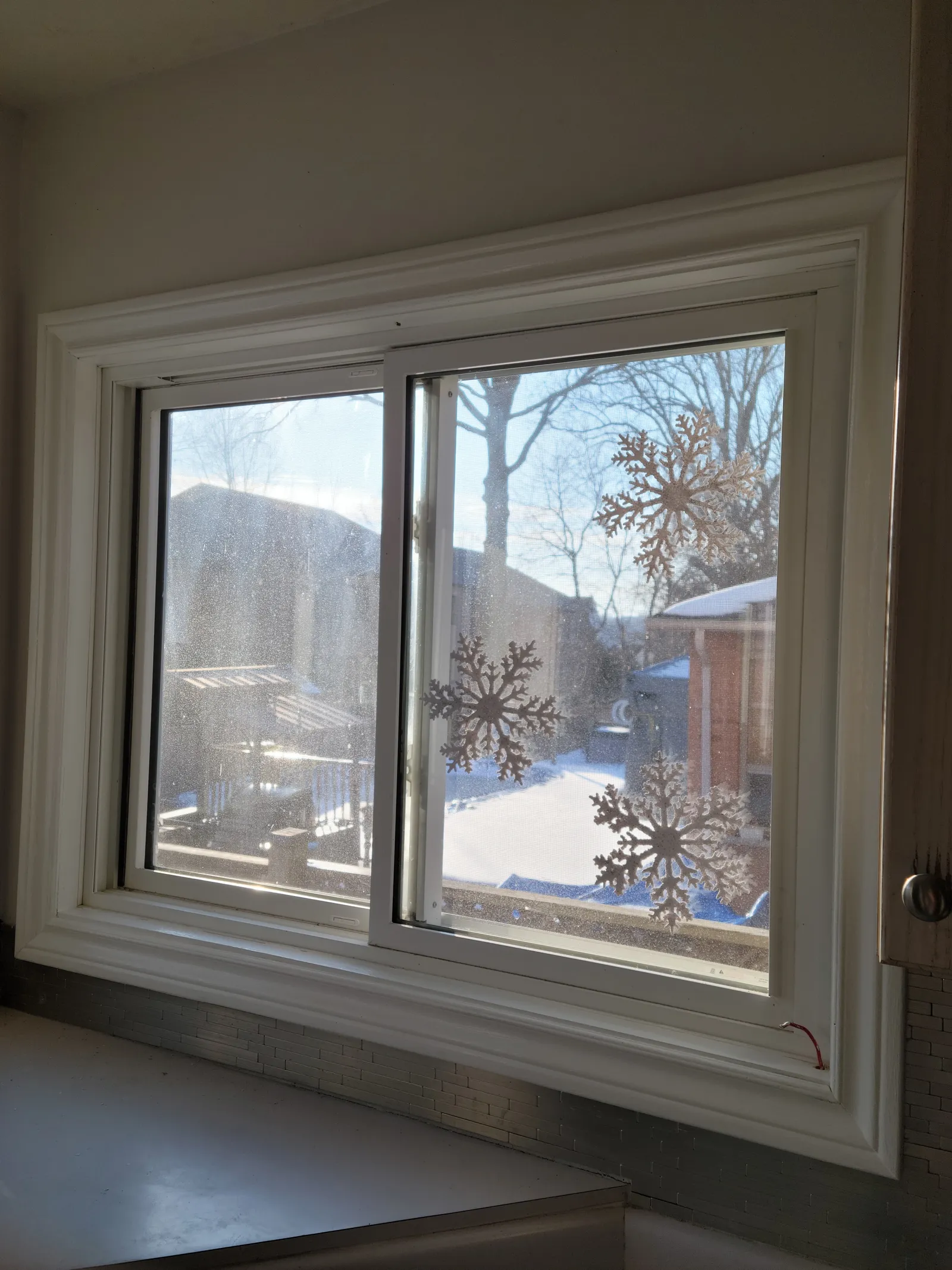 Window trim painting in Richmond Hill, Ontario by VOL Handyman